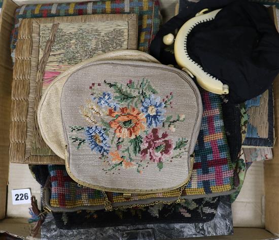 A collection of needleworked bags and purses